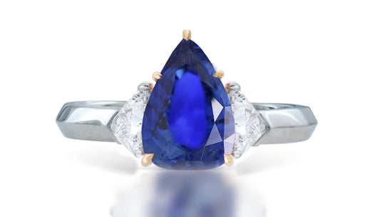 1 custom made unique pear blue sapphire center stone with trillion diamond accents three stone engagement ring