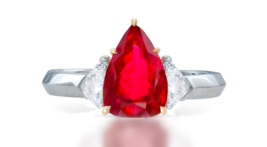 1 custom made unique pear ruby center stone with trillion diamond accents three stone engagement ring