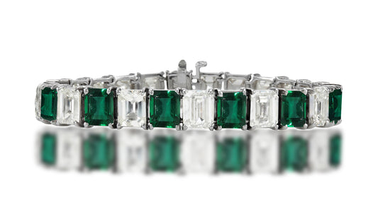 1 custom unique alternating emerald cut emerald and diamond tennis bracelet