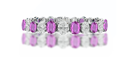 10 custom unique alternating oval pink sapphire and diamond tennis bracelet