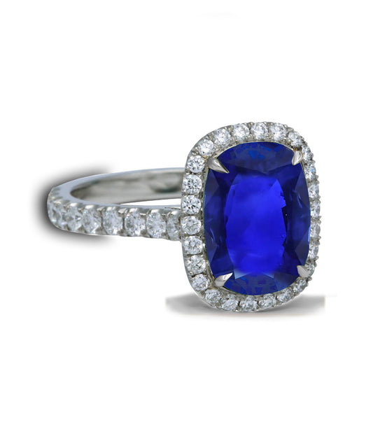 105 custom made unique oval cut blue sapphire and diamond halo engagement ring