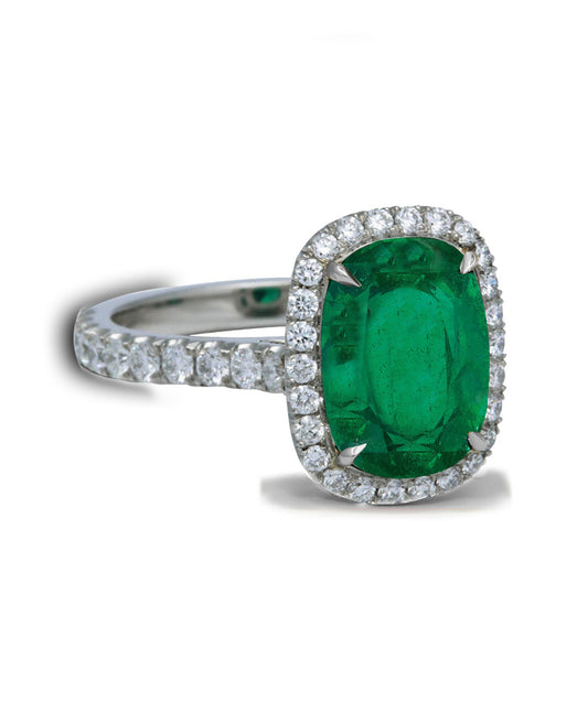 105 custom made unique oval cut emerald and diamond halo engagement ring