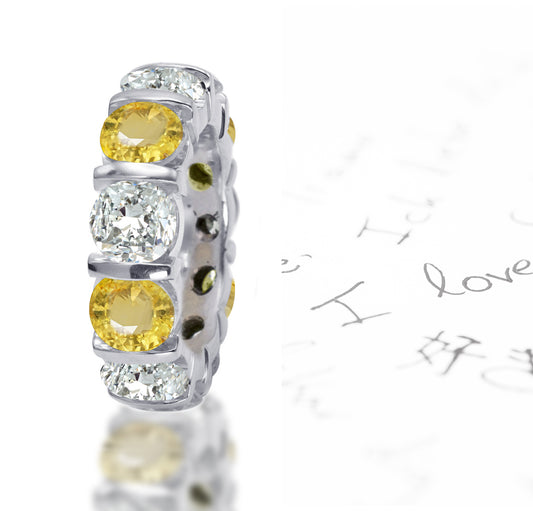 108 custom made unique stackable alternating round cut yellow sapphire and diamond bar set eternity ring