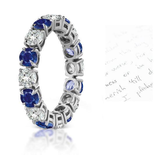 109 custom made unique stackable alternating round cut blue sapphire and diamond prong set eternity ring