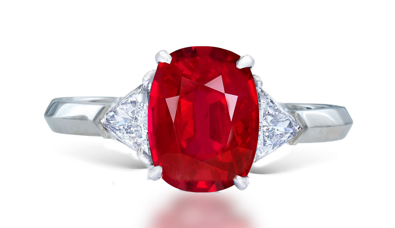 11 custom made unique oval ruby center stone with trillion diamond accents three stone engagement ring