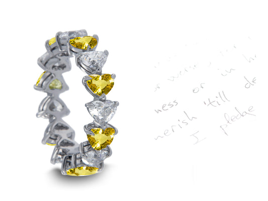 113 custom made unique stackable alternating heart yellow sapphire diamond prong set eternity ring