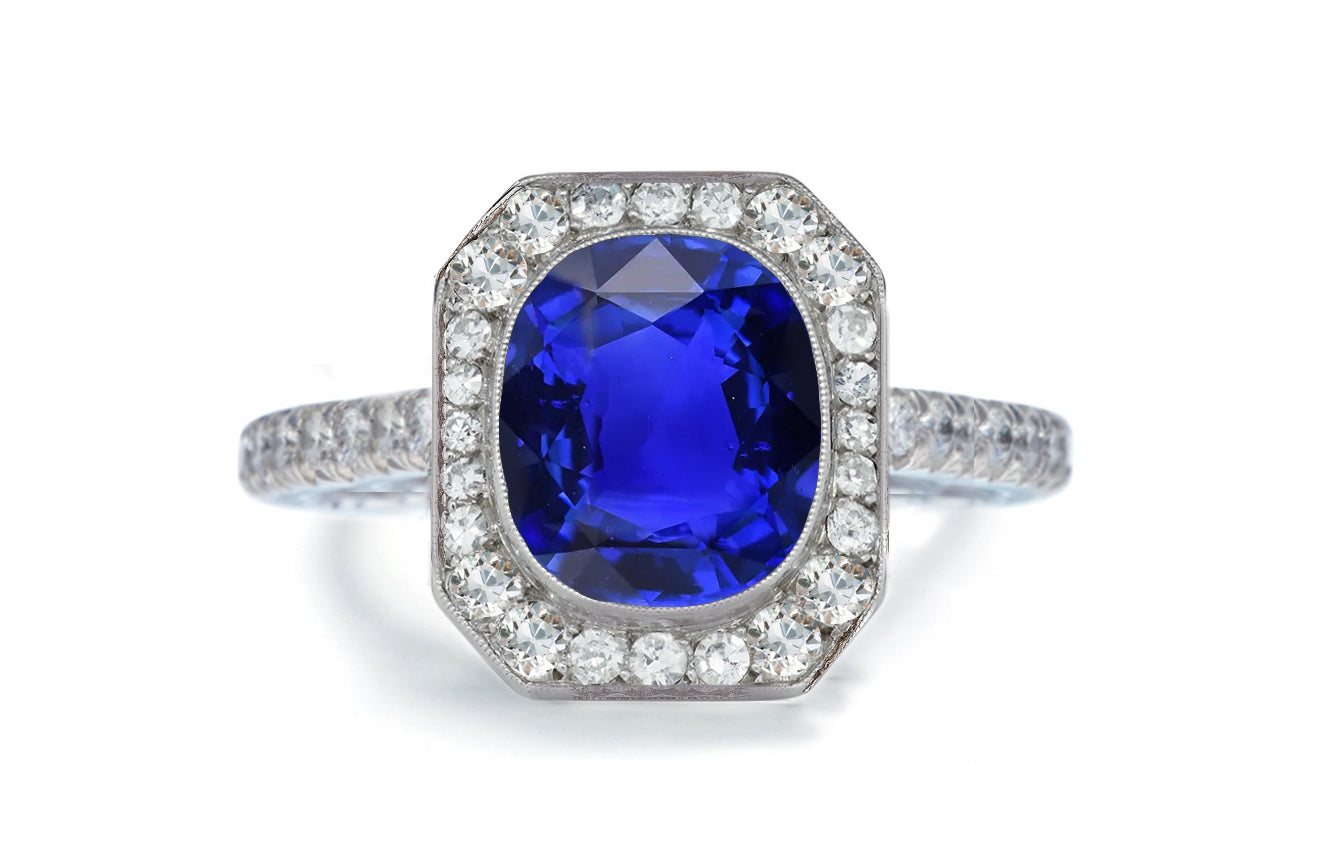1203 custom made vintage inspired blue sapphire and diamond floral halo engagement rings