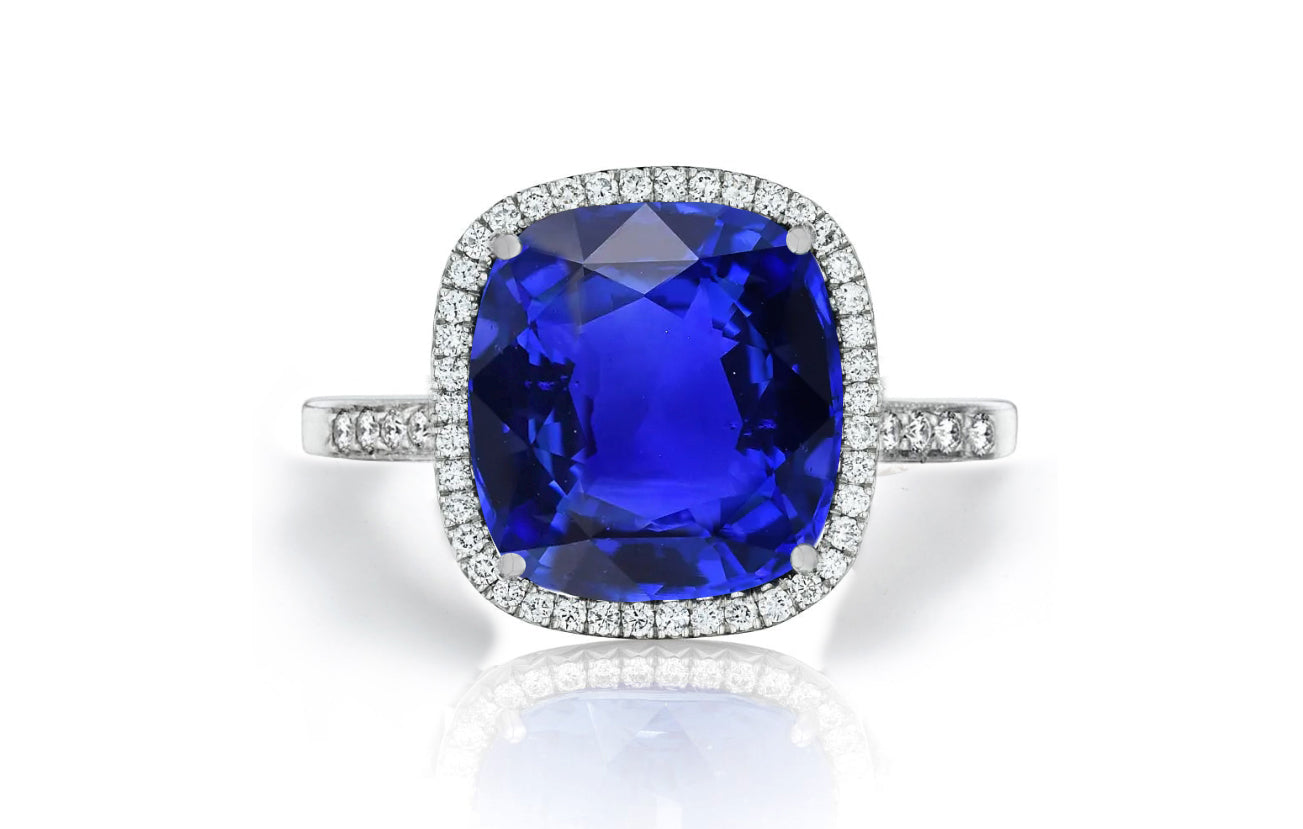 1206 custom made vintage inspired blue sapphire and diamond floral halo engagement rings
