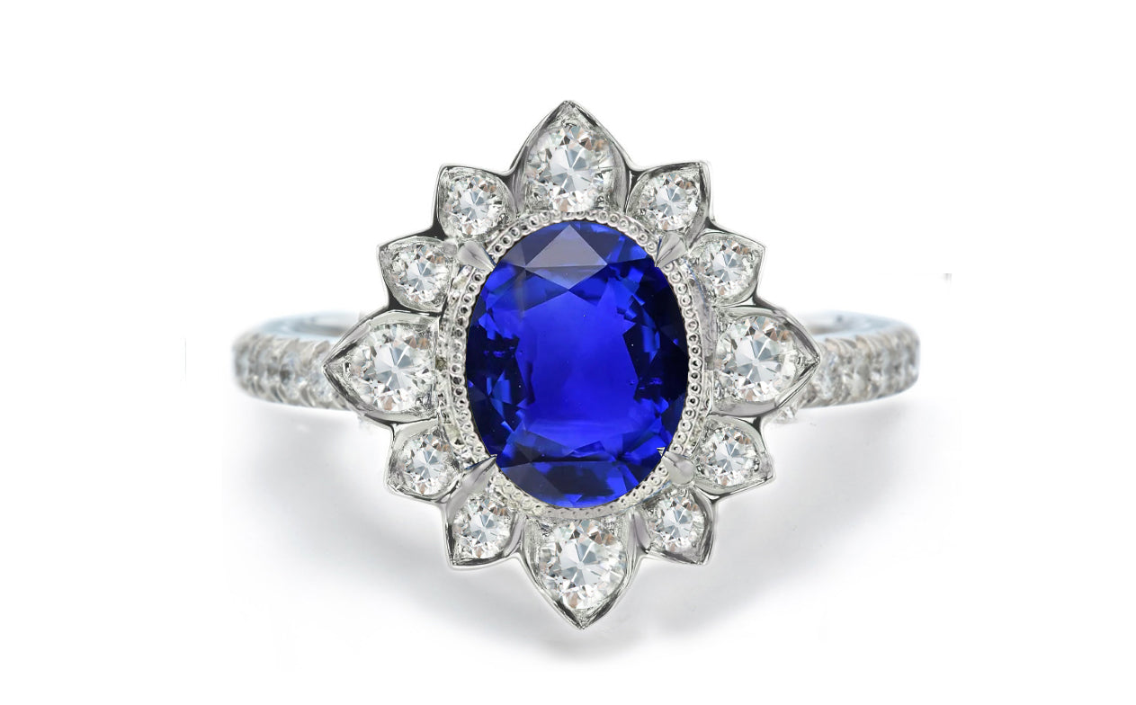 1207 custom made vintage inspired blue sapphire and diamond floral halo engagement rings