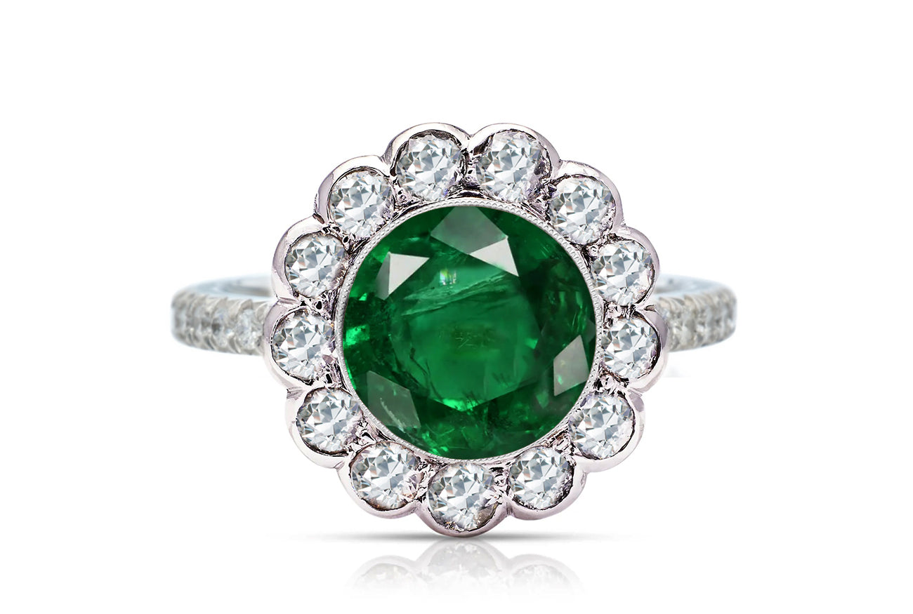 1214 custom made vintage inspired emerald and diamond floral halo engagement rings