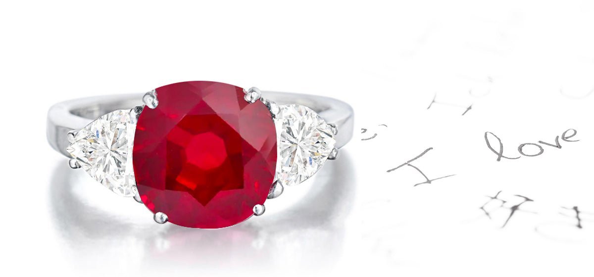 159 custom made unique round ruby center stone and heartt diamond accents three stone engagement ring