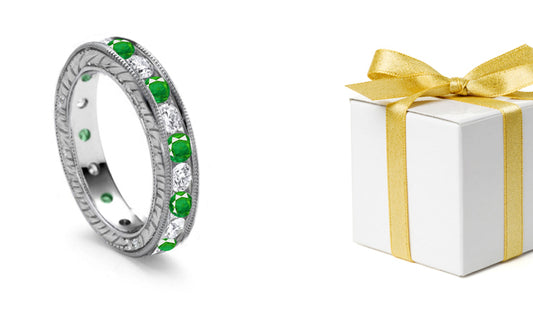stackable eternity ring with alternating round emeralds and diamonds