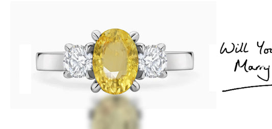 286 custom made unique oval yellow sapphire center stone and round diamond accent three stone engagement ring