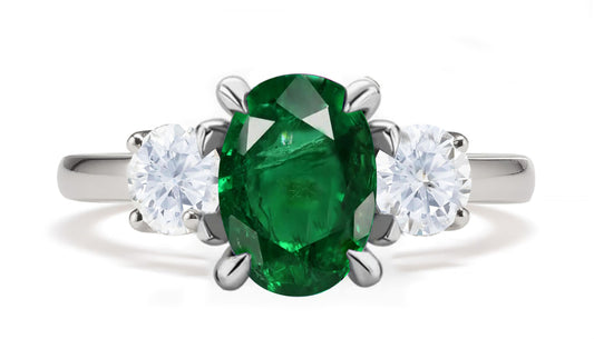 289 custom made unique oval emerald center stone and round diamond accent three stone engagement ring