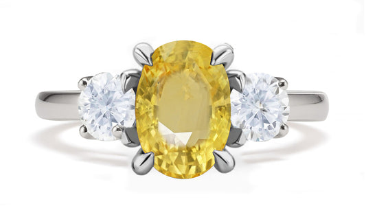 289 custom made unique oval yellow sapphire center stone and round diamond accent three stone engagement ring