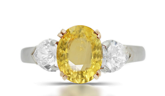 298 custom made unique oval yellow sapphire center stone and heart diamond accent three stone engagement ring