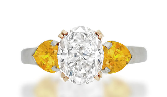 299 custom made unique oval diamond center stone and heart yellow sapphire accent three stone engagement ring
