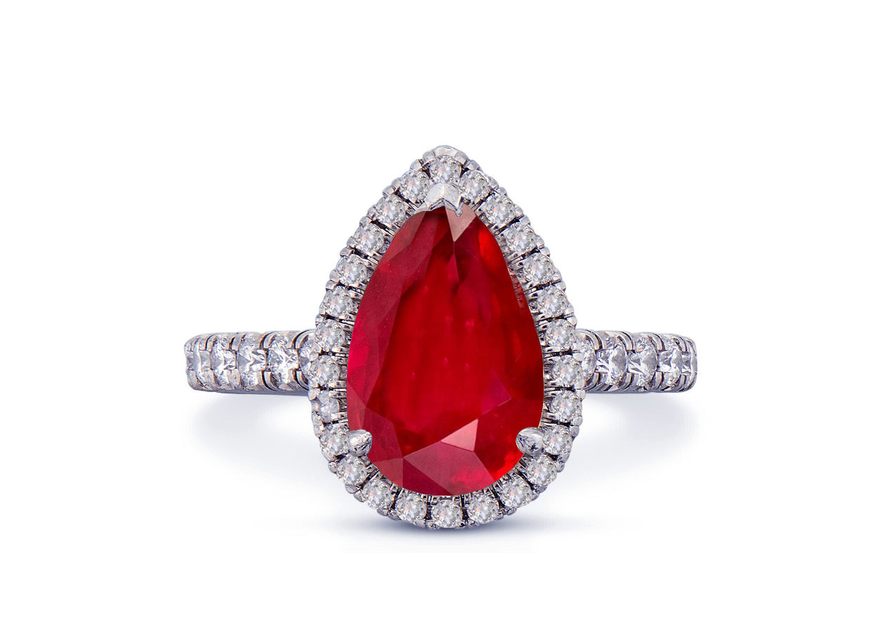 29 custom made unique pear ruby center stone with diamond halo and side diamond accents engagement ring