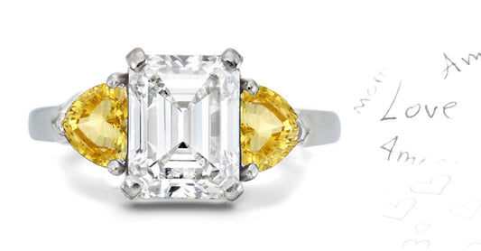 303 custom made unique emerald cut diamond center stone and heart yellow sapphire accent three stone engagement ring