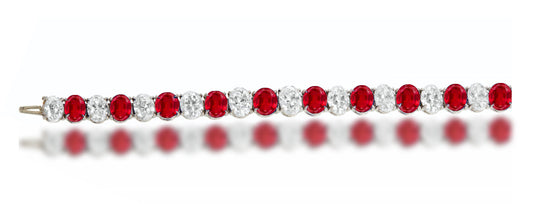 4 custom unique alternating oval ruby and diamond tennis bracelet.