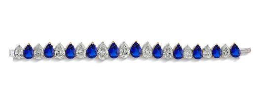 5 custom unique alternating pears blue sapphire and diamond tennis bracelet