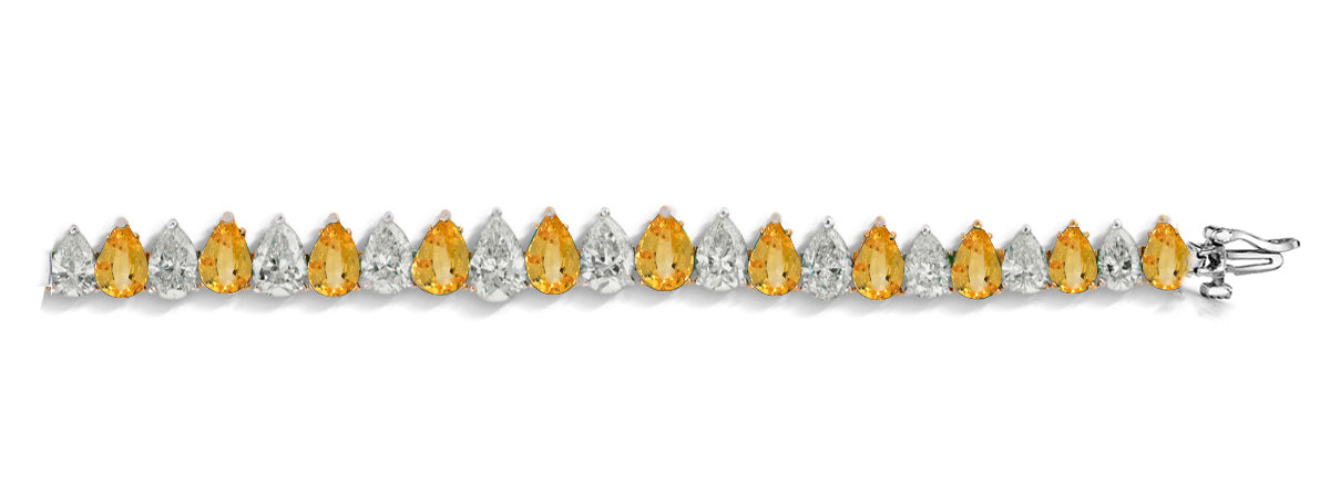 5 custom unique alternating pears yellow sapphire and diamond tennis bracelet