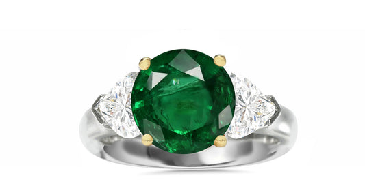 510 custom made unique round emerald center stone and heart diamond accent three stone engagement ring