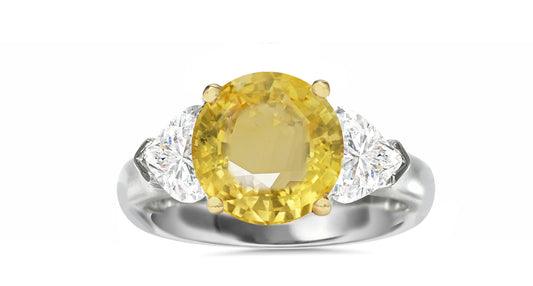 510 custom made unique round yellow sapphire center stone and heart diamond accent three stone engagement ring
