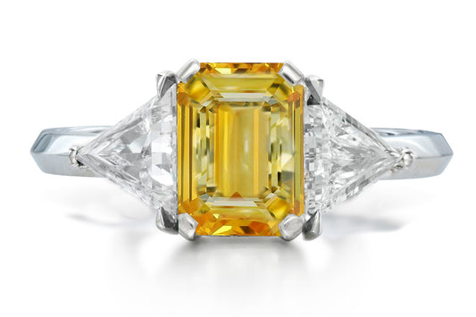 516 custom made unique emerald cut yellow sapphire center stone and trillion diamond accent three stone engagement ring