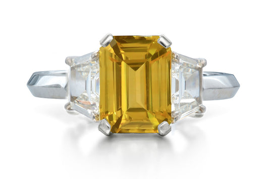518 custom made unique emerald cut yellow sapphire center stone and trapezoid diamond accent three stone engagement ring