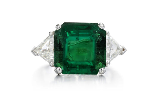 520 custom made unique asscher cut emerald center stone and trillion diamond accent three stone engagement ring