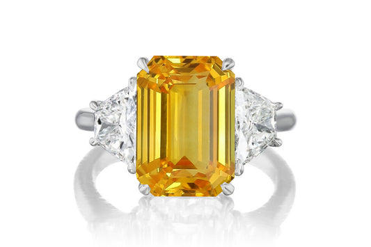 523 custom made unique emerald cut yellow sapphire center stone and trapezoid diamond accent three stone engagement ring