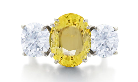 550 custom made unique oval yellow sapphire center stone and round diamond accent three stone engagement ring