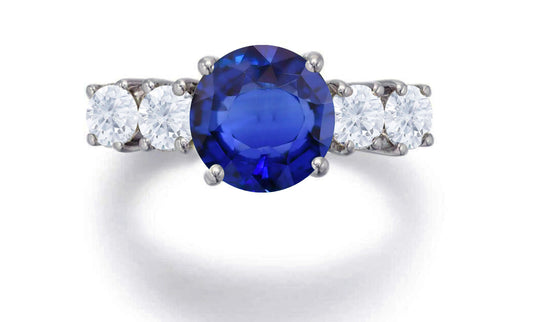 551 custom made unique round blue sapphire center stone and round diamond accents five stone engagement ring