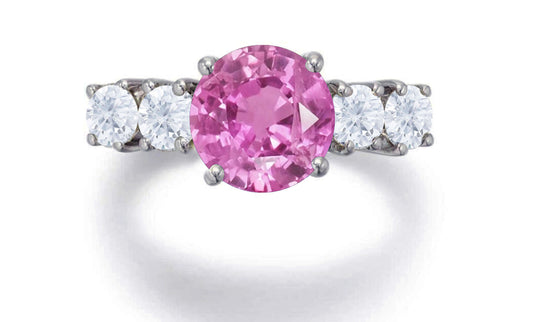 551 custom made unique round pink sapphire center stone and round diamond accents five stone engagement ring