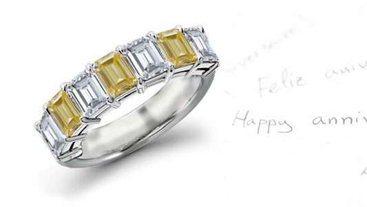 anniversary ring seven stone with alternating emerald cut yellow and white diamonds