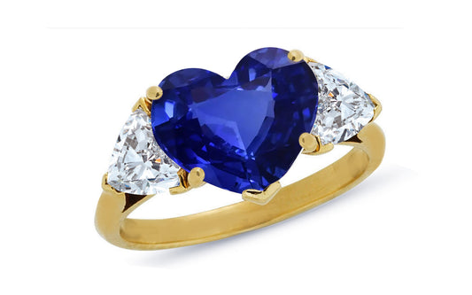 600 custom made unique heart blue sapphire center stone and heart diamond three stone engagement ring