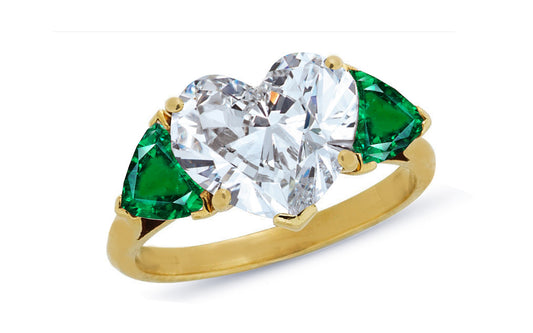 600 custom made unique heart diamond center stone and heart emerald three stone engagement ring
