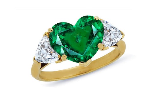 600 custom made unique heart emerald center stone and heart diamond three stone engagement ring