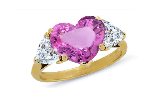 600 custom made unique heart pink sapphire center stone and heart diamond three stone engagement ring