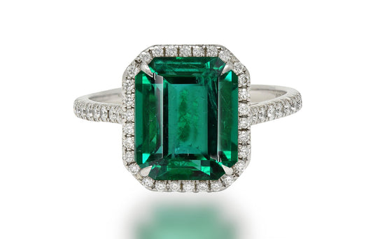 611 custom made unique emerald cut emerald center stone and diamond halo engagement ring