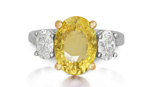619 custom made unique oval yellow sapphire center stone and oval diamond side three stone engagement ring