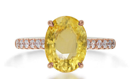 620 custom made unique oval yellow sapphire center stone and prong set diamond accent band engagement ring