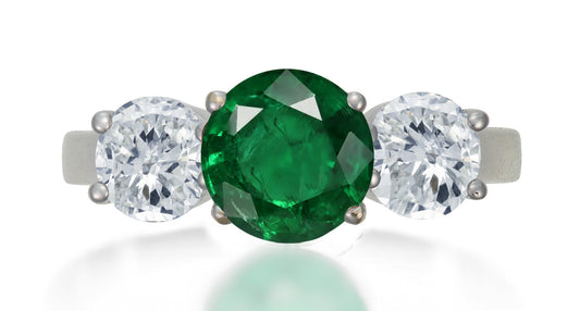 621 custom made unique round emerald center stone and round diamond accent three stone engagement ring