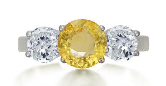 621 custom made unique round yellow sapphire center stone and round diamond accent three stone engagement ring