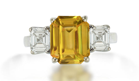 625 custom made unique emerald cut yellow sapphire center stone and asscher cut diamond accent three stone engagement ring