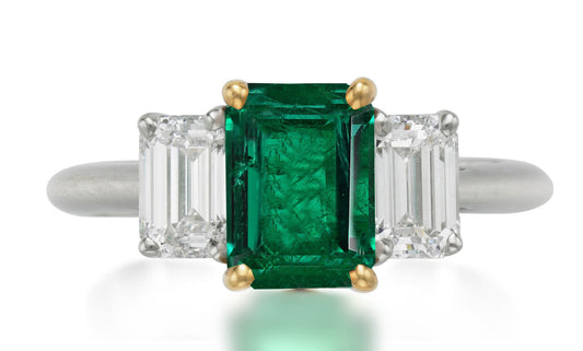 626 custom made unique emerald cut emerald center stone and emerald cut diamond accent three stone engagement ring