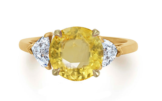 628 custom made unique round yellow sapphire center stone and heart diamond accent three stone engagement ring
