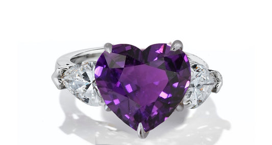 631 custom made unique heart purple sapphire center stone and heart diamond accent three stone engagement ring
