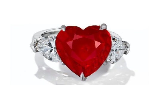 631 custom made unique heart ruby center stone and heart diamond accent three stone engagement ring